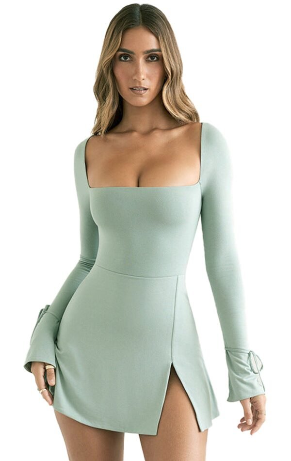 LuckeLadybug model wearing sage green slim fit wrap dress with square neckline long sleeves side slit and tie cuffs