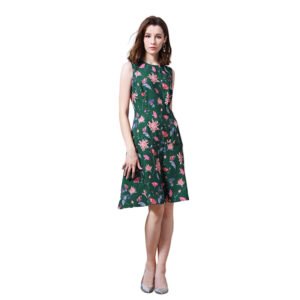 LuckeLadybug model wearing a green sleeveless floral A-line summer dress for women with pink blooms and fitted waist