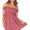 LuckeLadybug red smocked floral off shoulder dress worn by woman with hat sunglasses