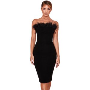 Model wearing LuckeLadybug little black cocktail dress women strapless fitted midi with feather trim elegant look