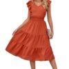 Model wearing rust tiered midi ruffled sleeveless summer dress with V neck smocked waist and sandals