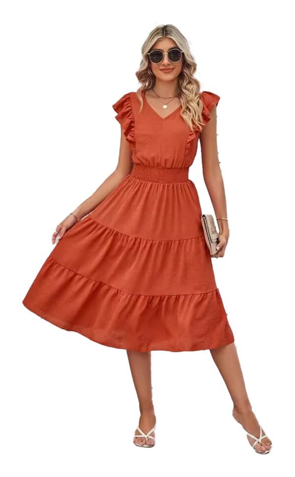 Model wearing rust tiered midi ruffled sleeveless summer dress with V neck smocked waist and sandals