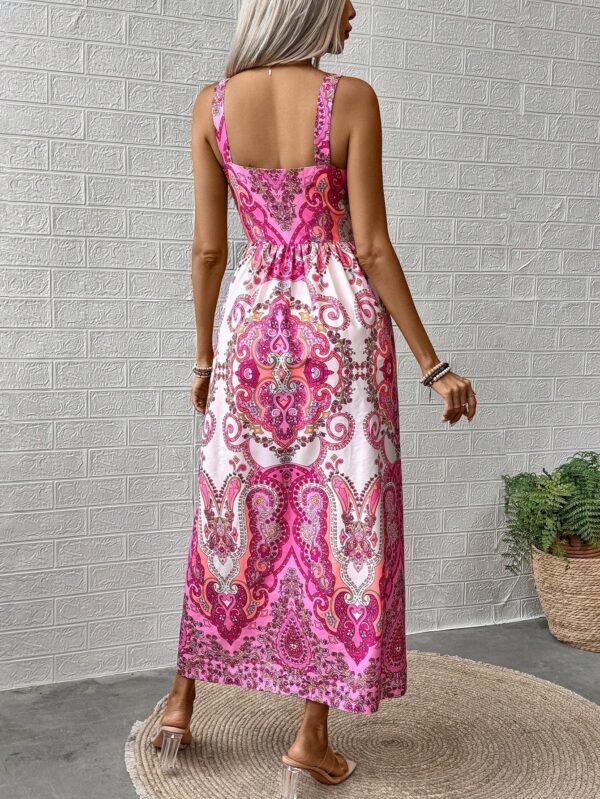 Woman wearing a pink and white bohemian maxi dress for women with intricate patterns and sleeveless design