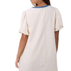 Back view of beige stripe seersucker dress by LuckeLadybug LLC with puff sleeves and relaxed fit