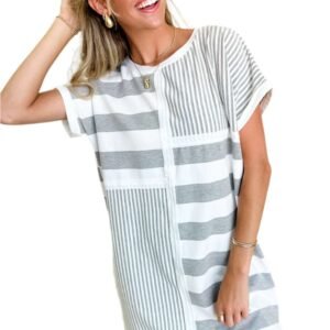 Woman wearing a gray stripe t shirt dress with mixed horizontal and vertical stripes by LuckeLadybug LLC