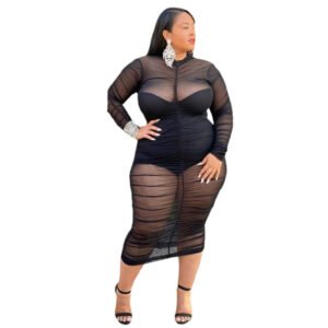 Plus size mesh bodycon dress worn by curvy woman with long sleeves and knee-length hem in black