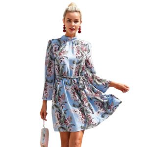 Model wearing LuckeLadybug light blue floral flare sleeve chiffon dress with belted waist and above knee hem