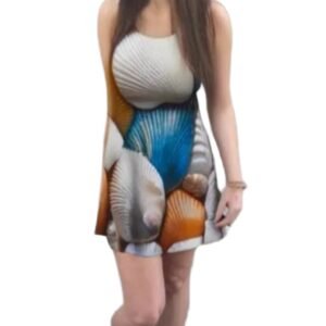 Woman wearing luckeladybug flare dress with seashell pattern called seaside shell dress